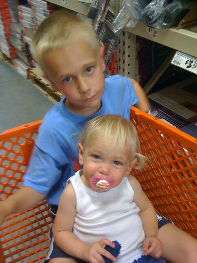 Kids in a shopping cart