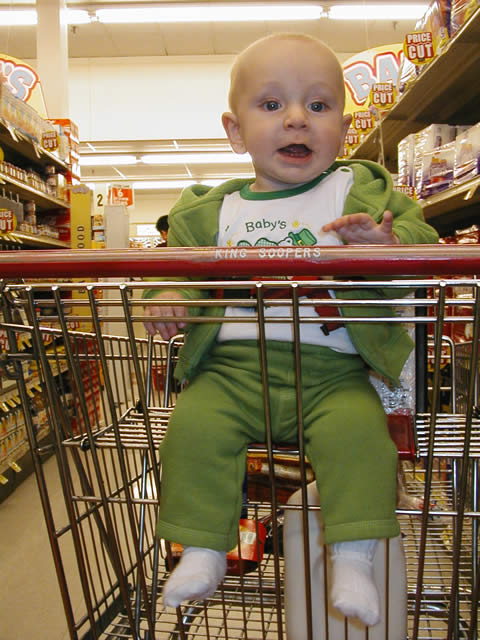 Kid in a shopping cart